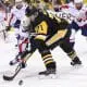 Pittsburgh Penguins Evgeni Malkin battles for a loose puck