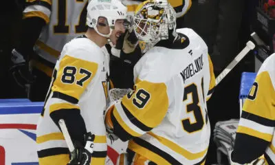 Pittsburgh Penguins Sidney Crosby congratulates Alex Nedeljkovic