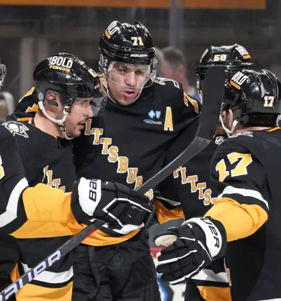 Pittsburgh Penguins celebrate. Pegnguins core questions. NHL trade rumors and playoff coverage