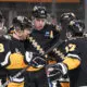 Pittsburgh Penguins celebrate. Pegnguins core questions. NHL trade rumors and playoff coverage