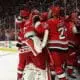 RALEIGH, NC - MAY 11: Members of the Carolina Hurricanes celebrate winning game 5 of the second round of the Stanley Cup Playoffs between the New Jersey Devils and the Carolina Hurricanes on May 11, 2023 at PNC Arena in Raleigh, North Carolina. (Photo by Katherine Gawlik/Icon Sportswire)