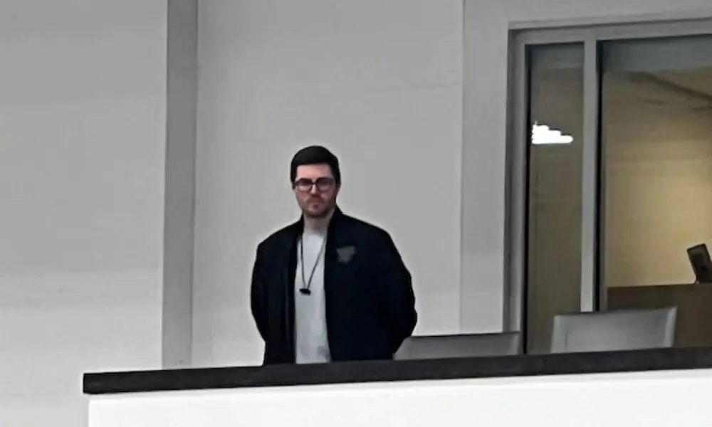 Kyle Dubas watches practice