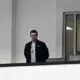 Kyle Dubas watches practice