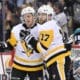 PITTSBURGH, PA - DECEMBER 17: Pittsburgh Penguins Right Wing Bryan Rust (17) celebrates his goal with Pittsburgh Penguins Right Wing Jake Guentzel (59) during the first period in the NHL game between the Pittsburgh Penguins and the Anaheim Ducks on December 17, 2018, at PPG Paints Arena in Pittsburgh, PA. (Photo by Jeanine Leech/Icon Sportswire)