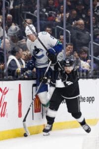 Pittsburgh Penguins Blaze Lizotte hits Canucks defenseman Tyler Myers