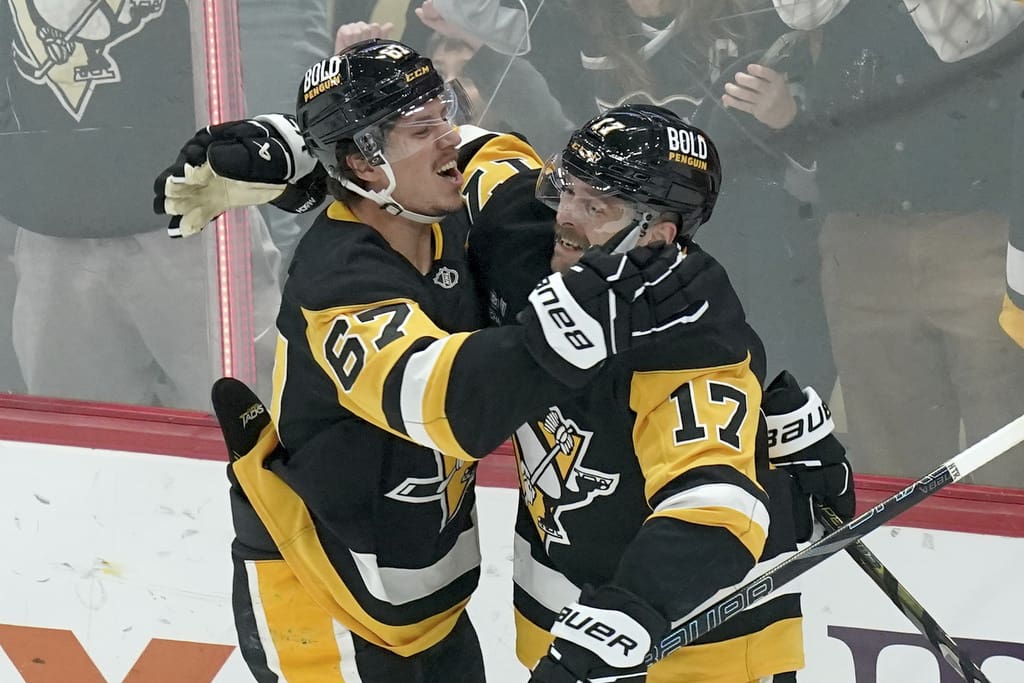 Pittsburgh Penguins game, Rickard Rakell, Bryan Rust, Pens beat Vancouver Canucks