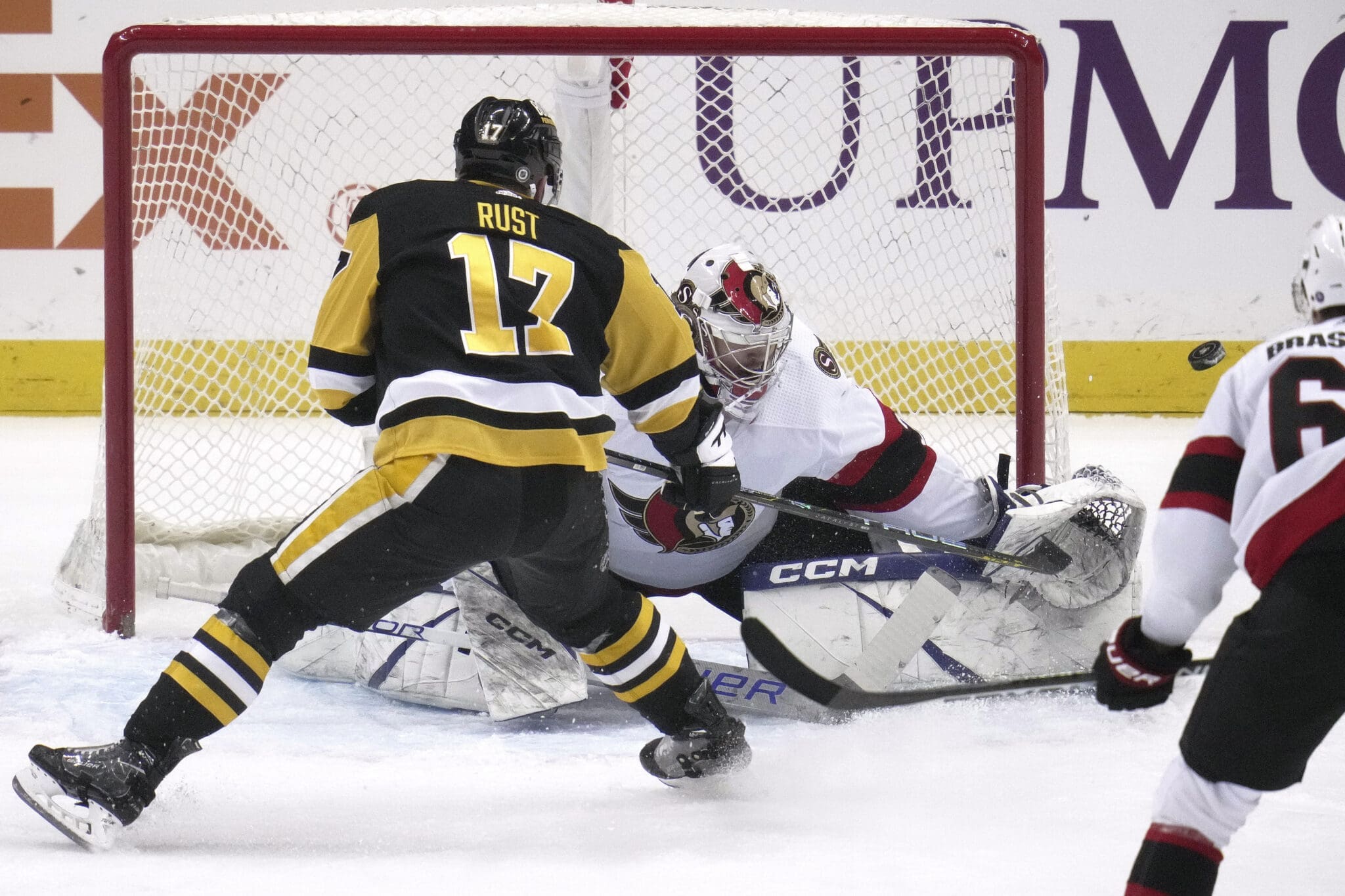 Ottawa Senators goalie Dylan Ferguson, Pittsburgh Penguins Bryan Rust