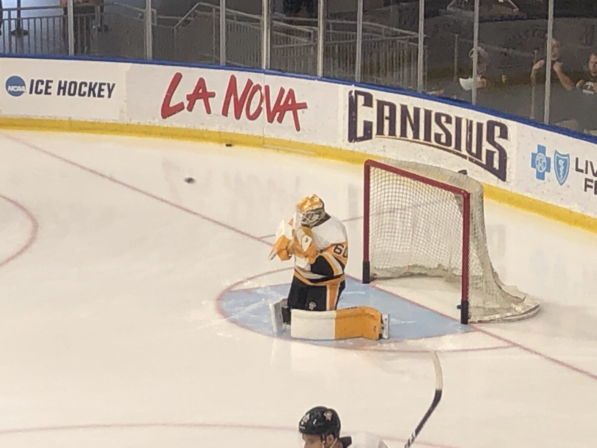 Emil Larmi makes a save during warmups. Photo by Dan Kingerski. All Rights Reserved.