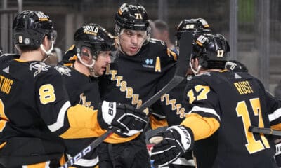 Pittsburgh Penguins celebrate. Pegnguins core questions. NHL trade rumors and playoff coverage