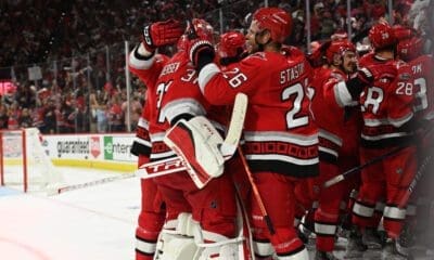 RALEIGH, NC - MAY 11: Members of the Carolina Hurricanes celebrate winning game 5 of the second round of the Stanley Cup Playoffs between the New Jersey Devils and the Carolina Hurricanes on May 11, 2023 at PNC Arena in Raleigh, North Carolina. (Photo by Katherine Gawlik/Icon Sportswire)